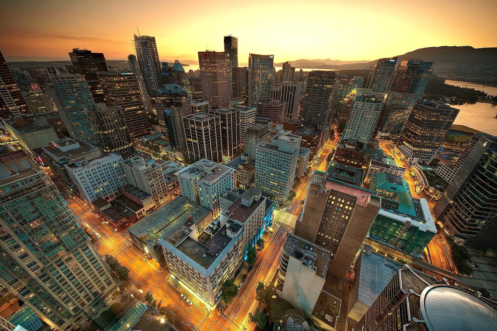 A dense downtown skyline of towers at sunset seen from above, a Wikimedia Commons photograph in Michael Stern's encyclopedia